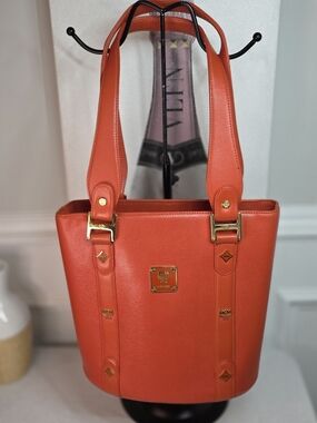MCM Orange Visetos leather studded tote bag w/ COA